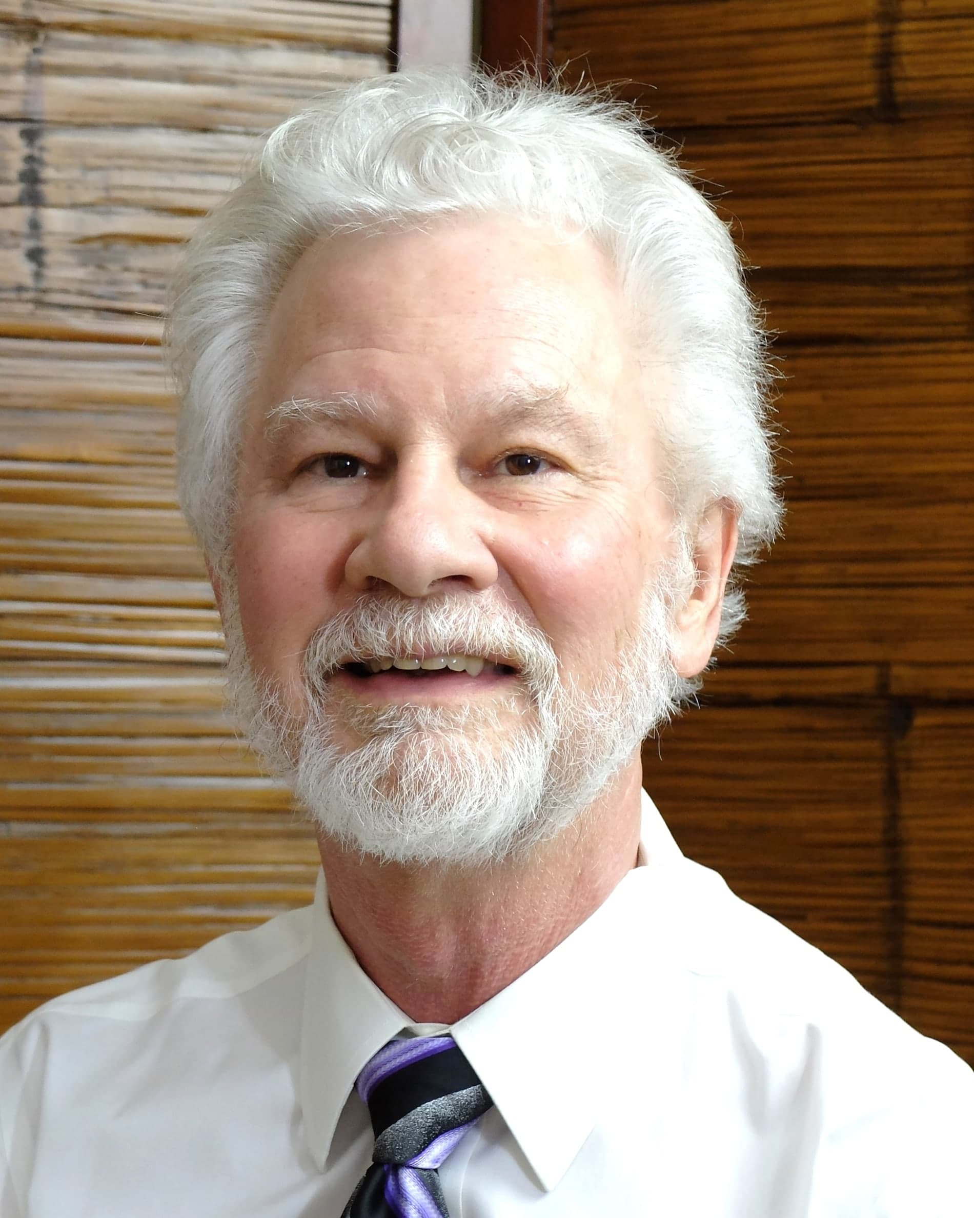 Head-and-shoulders portrait of the company's founder.